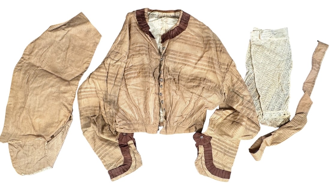 1860s Civil War Bodice with Transitioned 1870s Styling: This bodice is truly unusual. Based on the original sleeves - included - the bodice was sewn in the early to mid 1860s but based on the slimmer, embellished pagoda sleeves and lace false sleeves attac