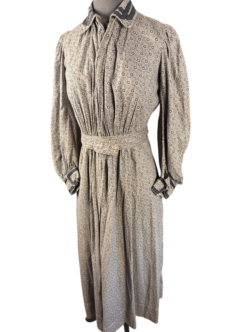 1905 Edwardian House Dress: Entirely machine sewn with the exception of finishwork and button holes, this Edwardian house dress is elegant in its simplicity. Full sleeves, full gathering in the front and back, and matching belt.