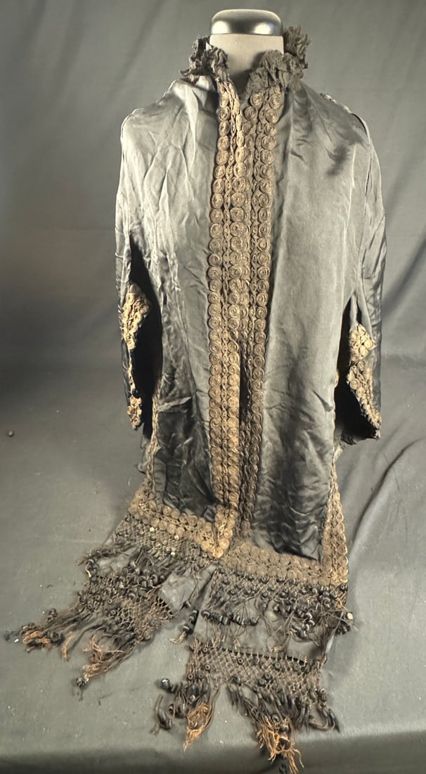 1860s Civil War Fringed Formal Cloak: This black taffeta fringed evening cloak is an outstanding and rare surviving example of the period. Similar garmets were frequently featured in Godey's Lady's Book but few survived intact. A truly ra