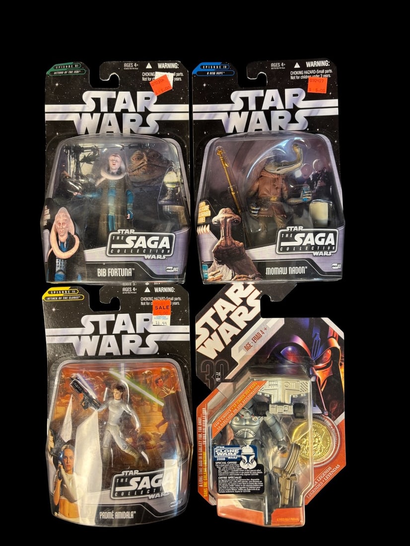 4 Star Wars Blister-carded Action Figures, Comprising 3 From the Saga Collection and 1 From the 30th: A group of four Star Wars blister-carded action figures. Three figures are from -The Saga Collection-: Bib Fortuna from -Episode VI Return of the Jedi,- Momaw Nadon from -Episode IV A New Hope,- and P