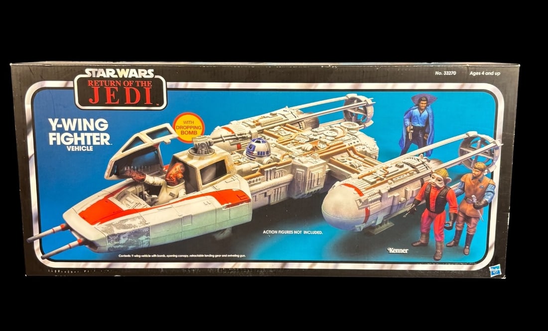 Vintage Star Wars Return of the Jedi Kenner/hasbro Y-wing Fighter Vehicle, No. 33270: A vintage Star Wars: Return of the Jedi Y-Wing Fighter Vehicle, manufactured by Kenner with Hasbro branding. This toy dates from the early 1980s and is presented in its original cardboard packaging. T
