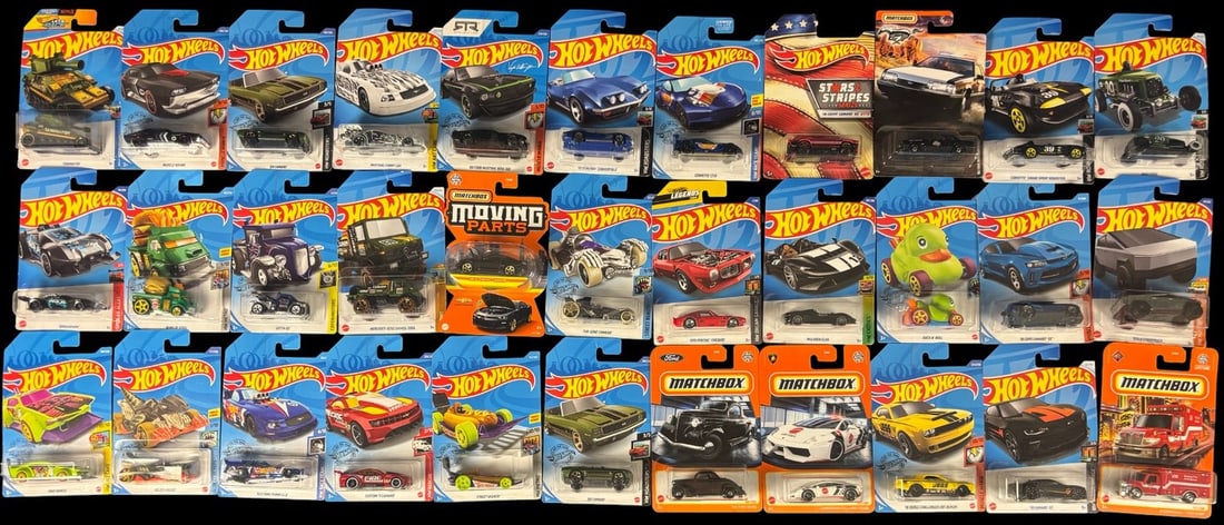 33 Hot Wheels and Matchbox Die-cast Miniature Vehicles: A collection of 33 Hot Wheels and Matchbox die-cast miniature vehicles. This lot comprises predominantly Hot Wheels with a few Matchbox items, all appearing to be modern production examples from vario