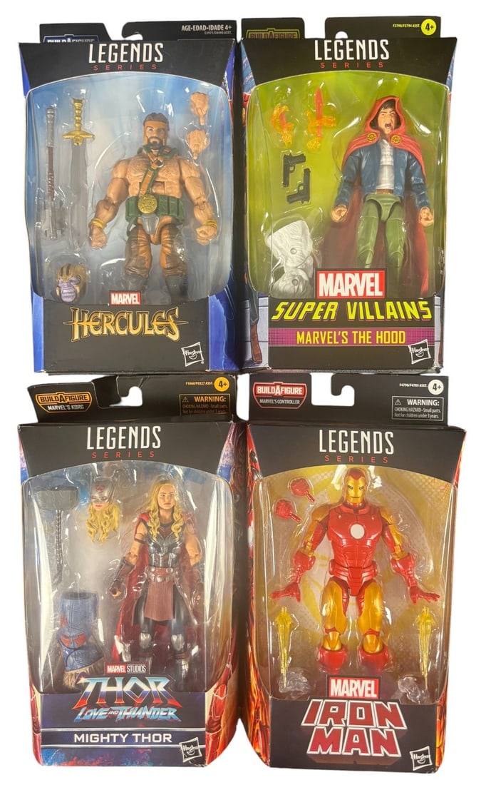 A 4 Hasbro Marvel Legends Series Action Figures, Hercules, the Hood, Mighty Thor, and Iron Man: A set of four contemporary Hasbro Marvel Legends Series plastic action figures. Each figure is factory-sealed in its original cardboard box with clear plastic blister packaging. The set comprises -Her