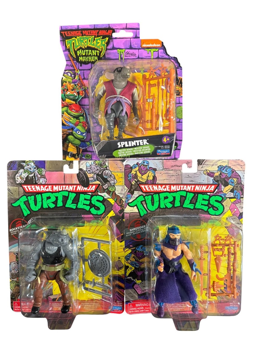 3 Teenage Mutant Ninja Turtles Action Figures, Mutant Mayhem Splinter and Classic Style Rockstead: A group of three Teenage Mutant Ninja Turtles action figures, each sealed within its original blister packaging. The lot includes one -SPLINTER- figure from the -MUTANT MAYHEM- line, identified throug