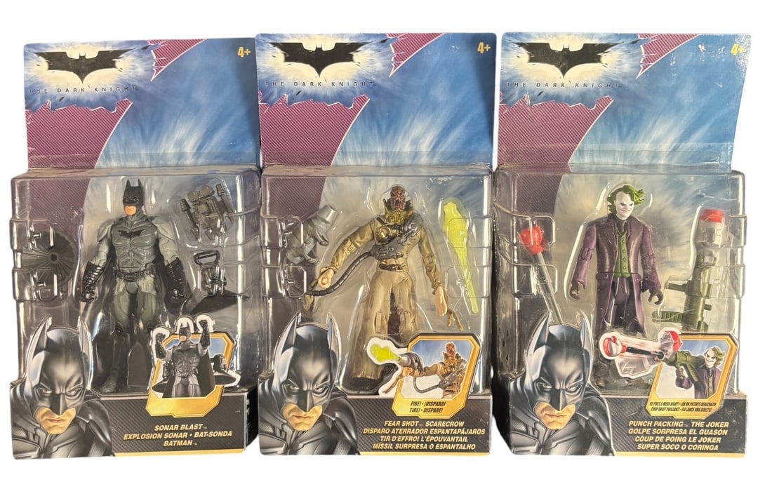 3 Mattel the Dark Knight Series Action Figures, Comprising Fear Shot Scarecrow, Sonar Blast Batman,: A group of three Mattel -The Dark Knight- series plastic action figures. Each figure is presented in its original, sealed blister packaging with cardboard backing, marked for ages 4+. The figures incl