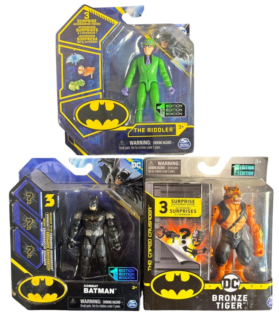 3 Spin Master 1st Edition Dc Comics Action Figures: the Riddler, Combat Batman, and Bronze Tiger: A group of three contemporary DC Comics action figures from the -1ST EDITION- series, manufactured by Spin Master. Each plastic figure?-THE RIDDLER?- -depicted in a green suit-, -COMBAT BATMAN?- -in a