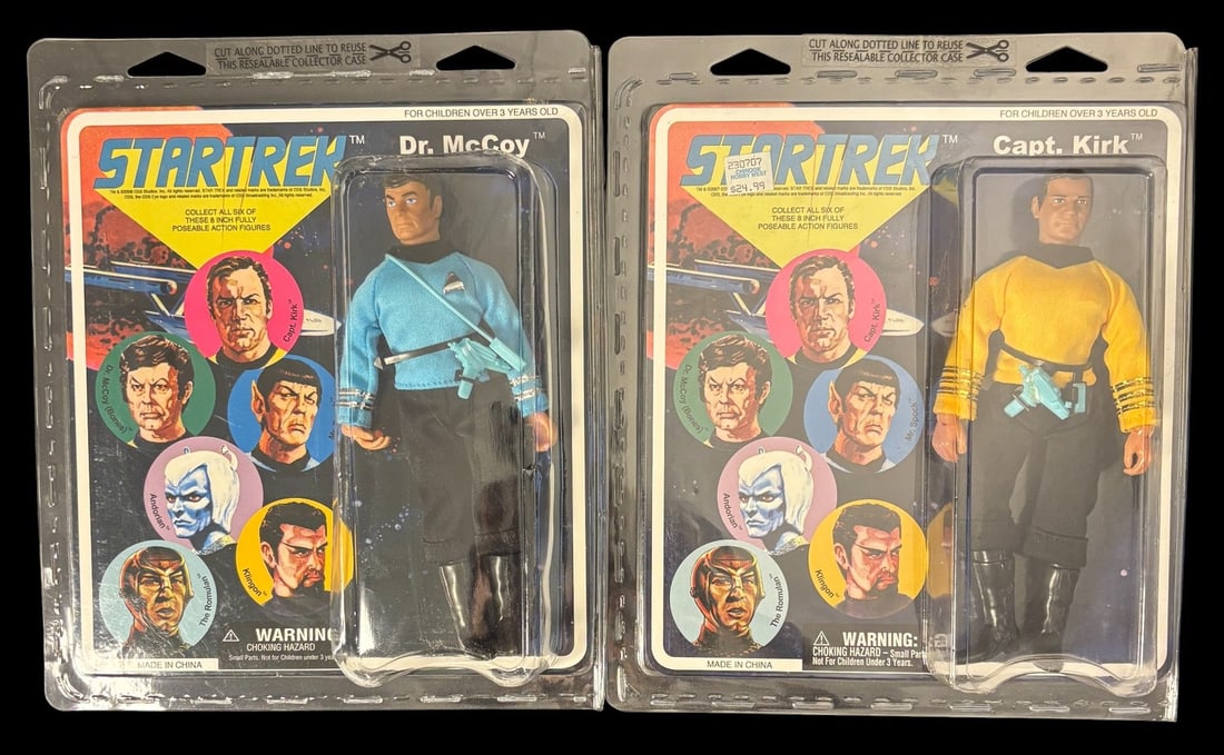 A Pair of Star Trek Mego-style Dr. Mccoy and Capt. Kirk Action Figures, 2008: This lot features a pair of Star Trek Mego-style action figures, depicting Dr. McCoy and Capt. Kirk, produced in 2008. Each figure is approximately 8 inches tall and remains sealed in its original, un