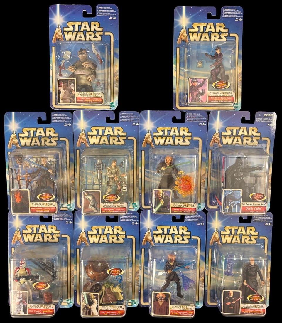 10 Hasbro 2002 Star Wars Attack of the Clones and the Empire Strikes Back Action Figures: A group of ten unopened Hasbro Star Wars action figures in their original blister card packaging. Predominantly from the -Attack of the Clones- series, this collection includes figures such as Dexter