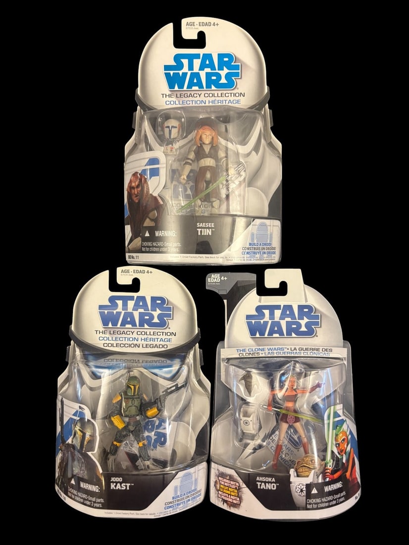 3 Star Wars Hasbro Action Figures: the Legacy Collection Saesee Tiin, Jodo Kast, and the Clone Wars: A group of three Hasbro Star Wars collectible action figures, each sealed in its original plastic blister packaging with cardboard backing. The figures include: 1. **Saesee Tiin -BD No. 11-:** From -T