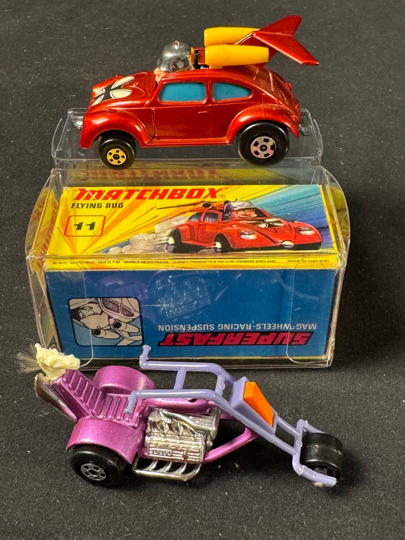 Matchbox Superfast No. 11b-flying Bug-With Original Box and an Additional Trike, Circa 1969: A Matchbox Superfast No. 11b -Flying Bug- die-cast model car, circa 1969, accompanied by its original box, and a separate Matchbox Superfast trike. The -Flying Bug- model features a red die-cast metal