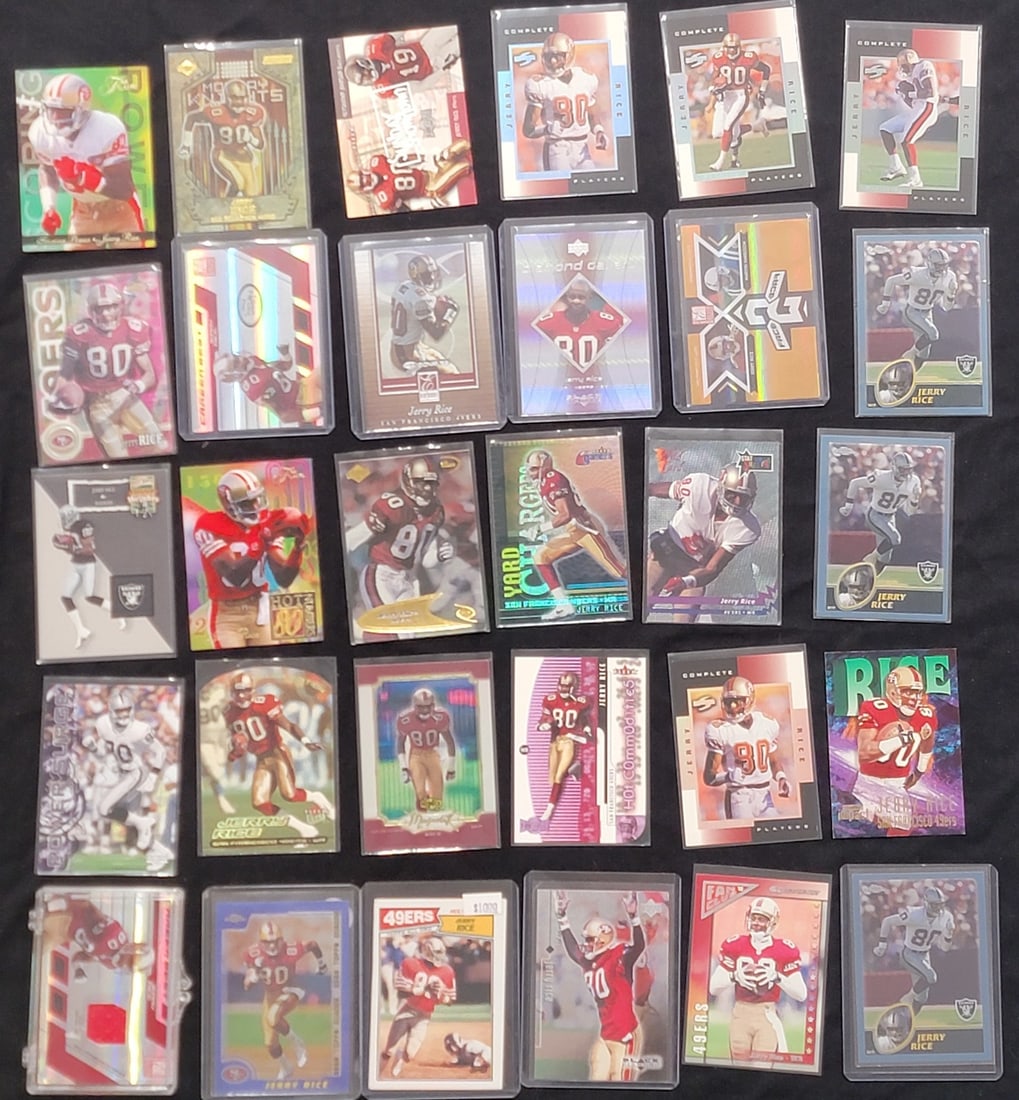 Approximately 60 American Football Trading Cards, Predominantly Featuring Jerry Rice of the San: This lot comprises approximately 60 American football trading cards, predominantly featuring player Jerry Rice, frequently shown in a San Francisco 49ers uniform with jersey number 80. The collection 