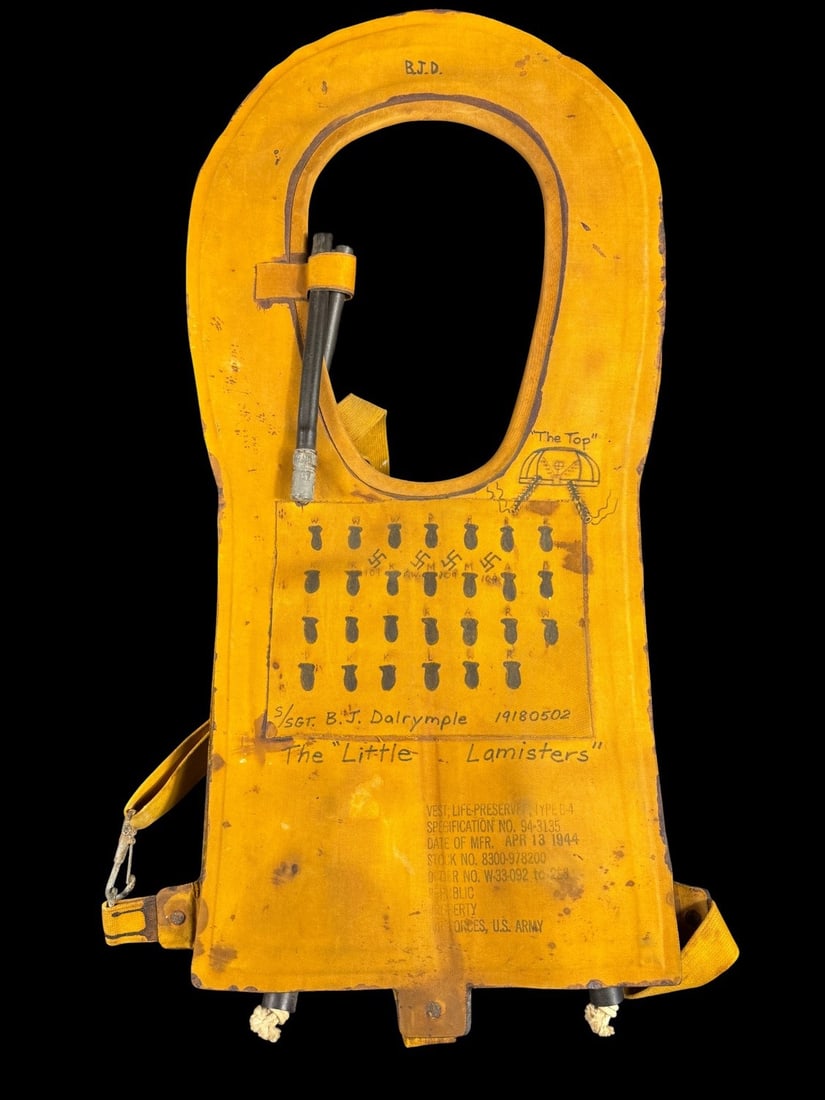 WWII B-4 Life Vest Mission Marked and Named - Rare: Named to Staff Sgt B.J Dalrymple, his aircraft name - The Little Lamisters, a drawing of his gun position - top turret, outline of 27 bombs indicating missions, 4 swasticas - 3 109s and 1 FW - enemy a