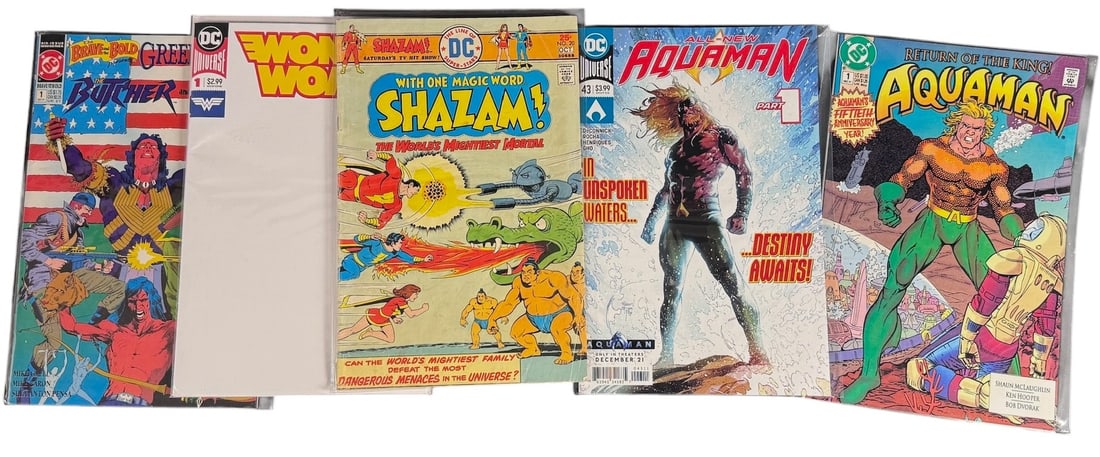 DC Comic Books including Shazam and Aquaman Titles: A collection of DC comic books featuring a variety of titles and characters from the Bronze Age through the modern era. The assortment includes Shazam! The Worlds Mightiest Mortal No. 20, Aquaman No.