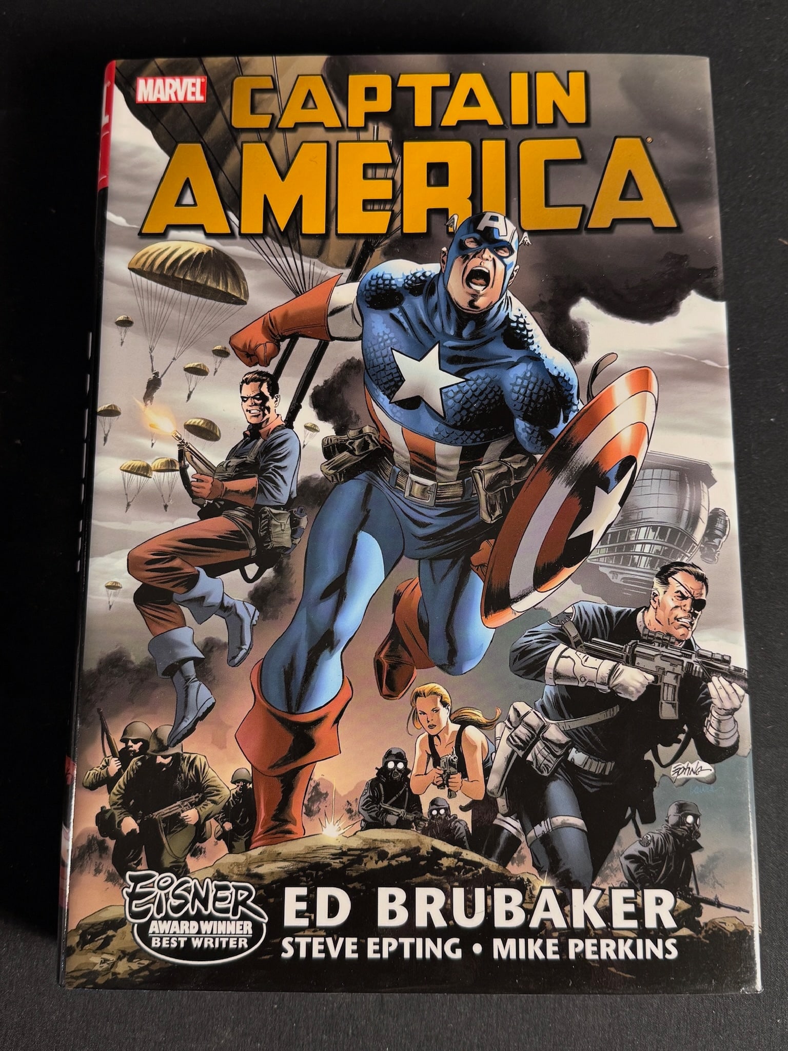Captain America by Ed Brubaker Omnibus Vol. 1 1st Printing: This hardcover omnibus volume, published by Marvel Publishing, Inc. in 2007, compiles Captain America issues 1 through 25, the Captain America 65th Anniversary Special, and Winter Soldier: Winter
