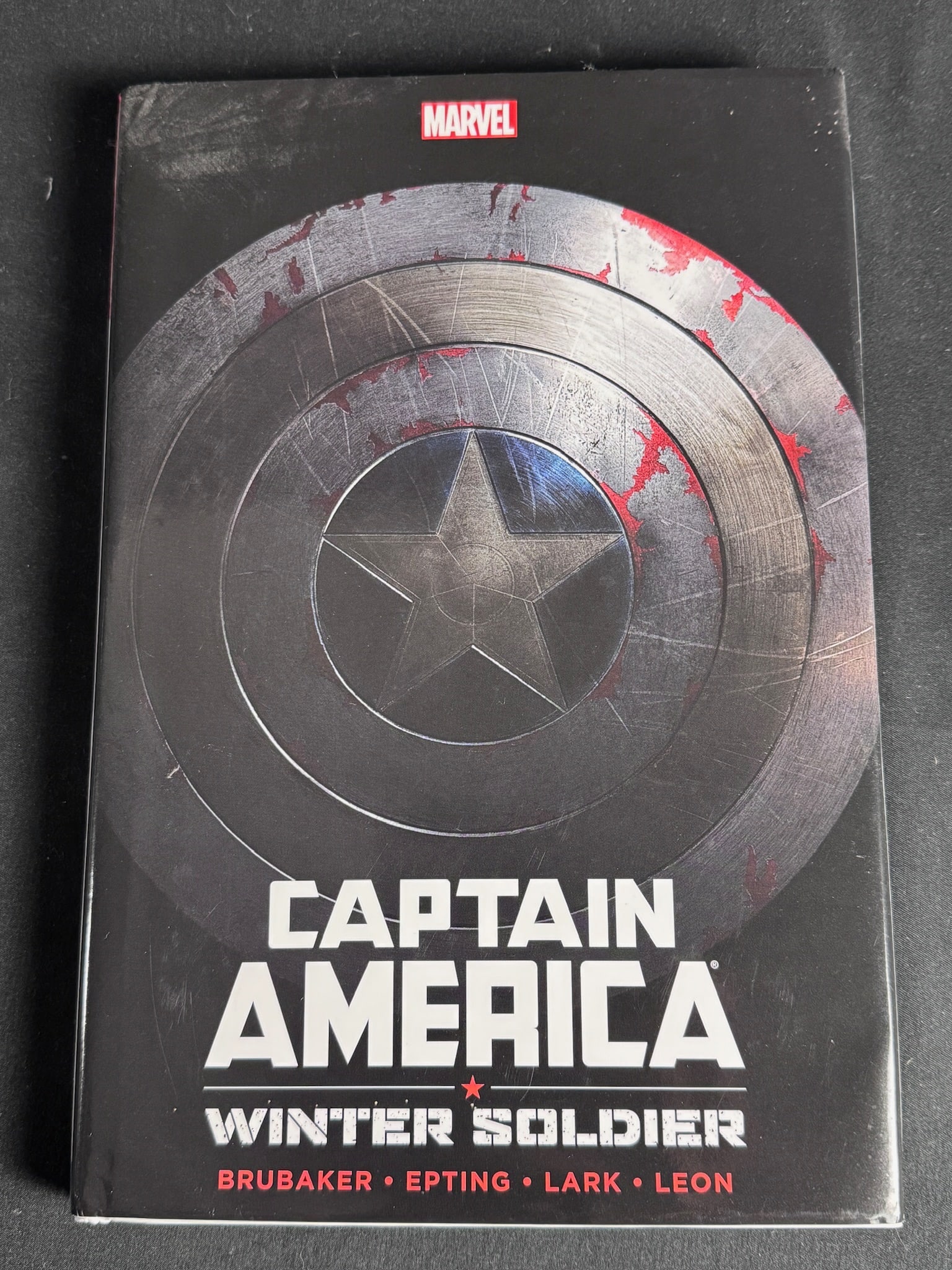Captain America: Winter Soldier. Marvel 2014. First Printing DJ: Brubaker, Ed writer; Steve Epting, Michael Lark, and John Paul Leon artists. Captain America: Winter Soldier. New York: Marvel Worldwide, Inc., 2014. First edition, first printing, with a full number