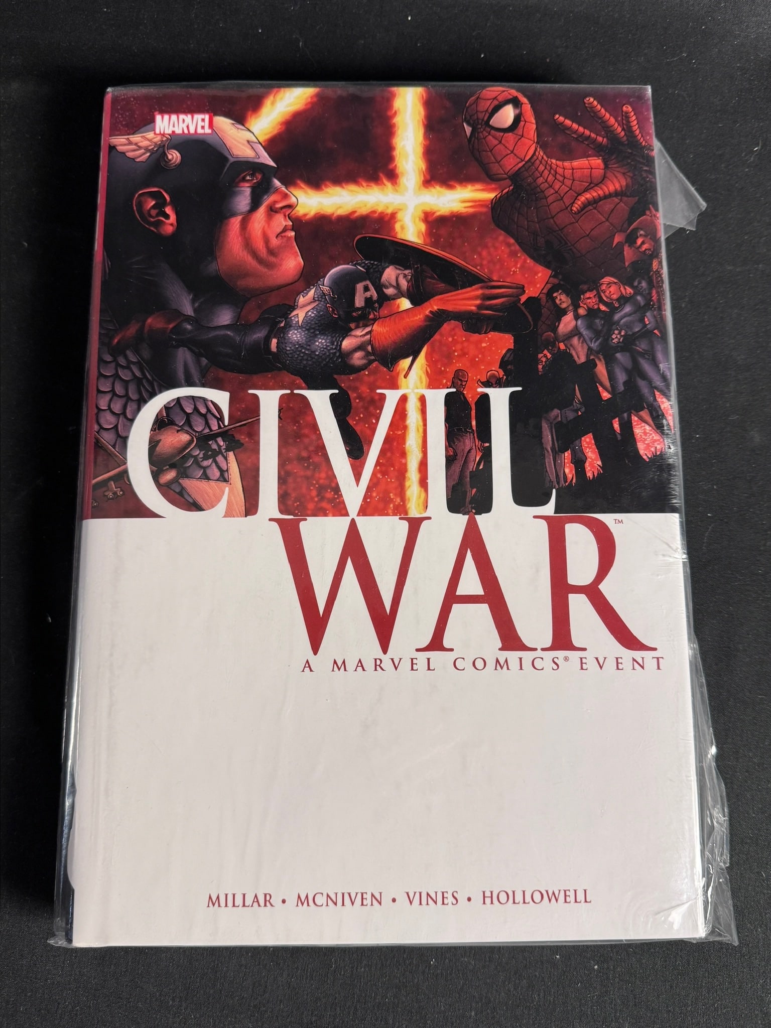 Civil War. Marvel 2007. First Edition DJ: Mark Millar and Steve McNiven. Civil War: A Marvel Comics Event. New York: Marvel Publishing, Inc., 2007. First Edition, First Printing. Hardcover, quarto. This volume collects the complete