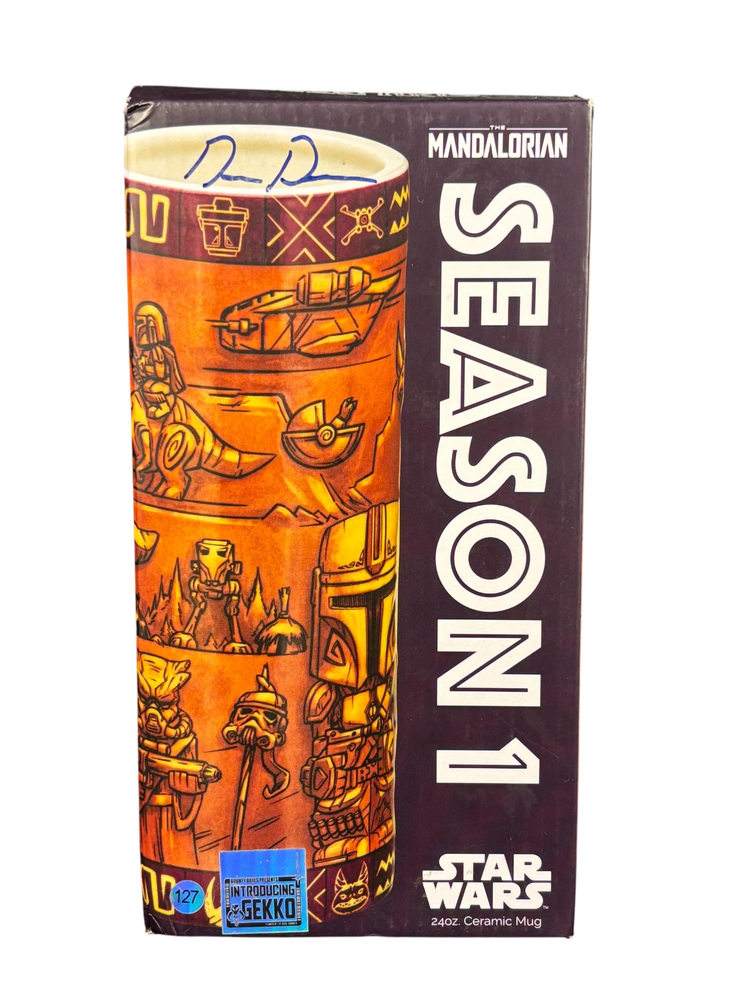 Geeki Tikis Star Wars: The Mandalorian Season 1 Scenic Ceramic Mug: A Beeline Creative Geeki Tikis Star Wars: The Mandalorian Season 1 Scenic ceramic mug with a 24-ounce capacity. The exterior features a wrap-around graphic design in shades of orange and yellow depict