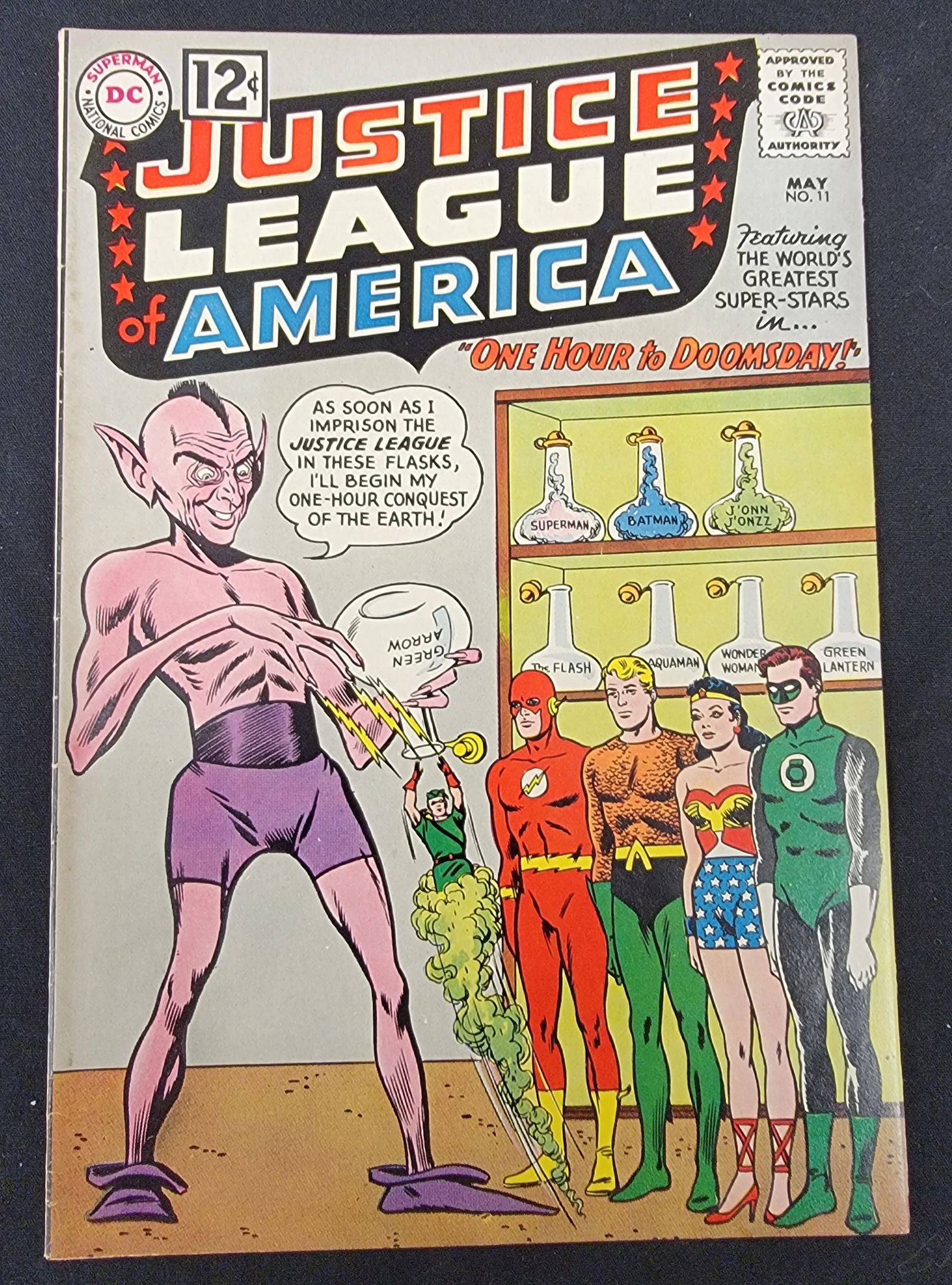 Justice League of America 11 DC Comics May 1962: Justice League of America 11, published by National Comics Publications DC Comics with a cover date of May 1962. This Silver Age comic book features the narrative illustration One Hour to Doomsday!