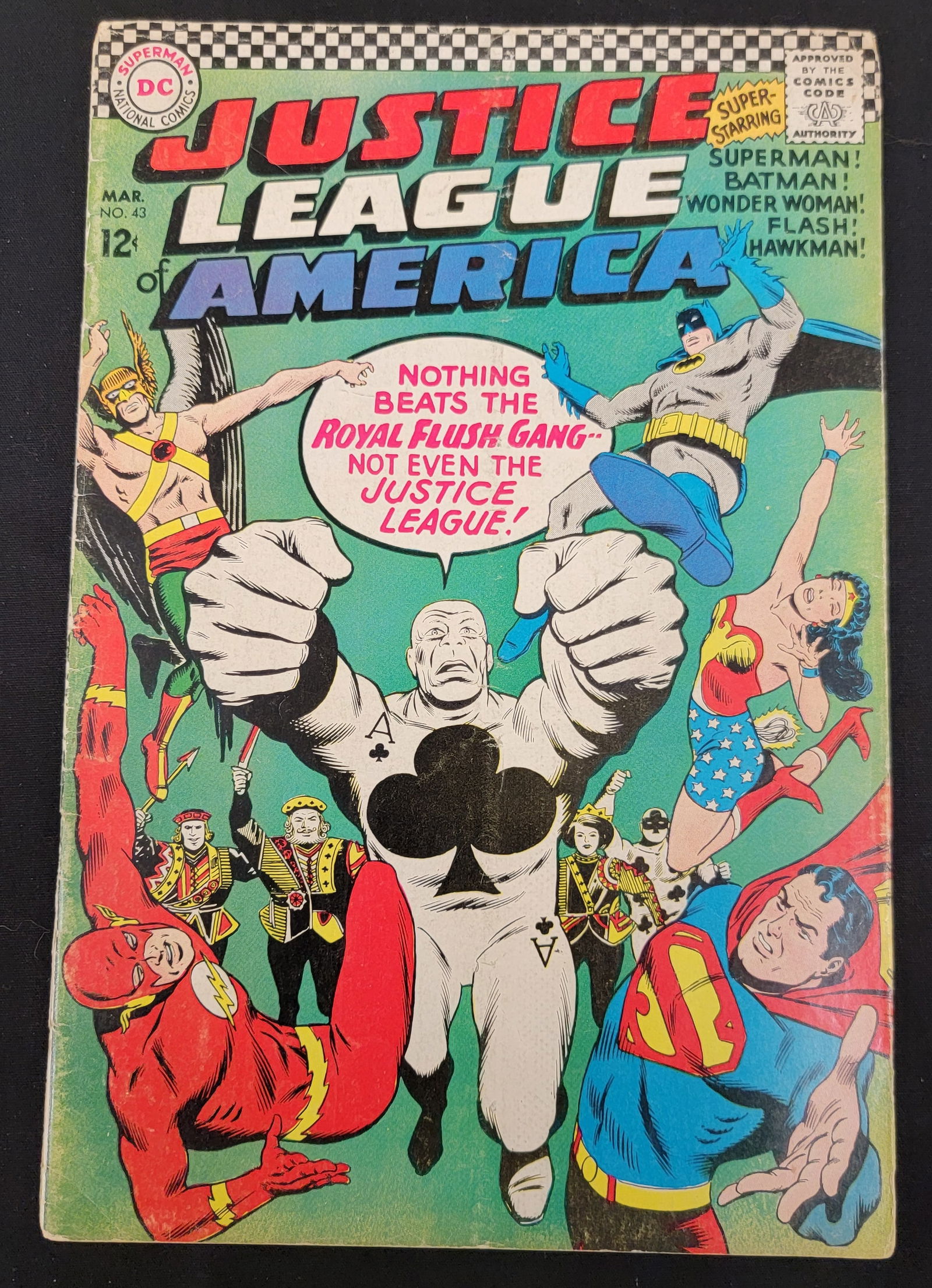 Justice League of America 43 DC Comics March 1966: Justice League of America No. 43, published by DC National Comics in March 1966. This Silver Age comic book features a cover illustration of the Royal Flush Gang confronting Superman, Batman, Wonder