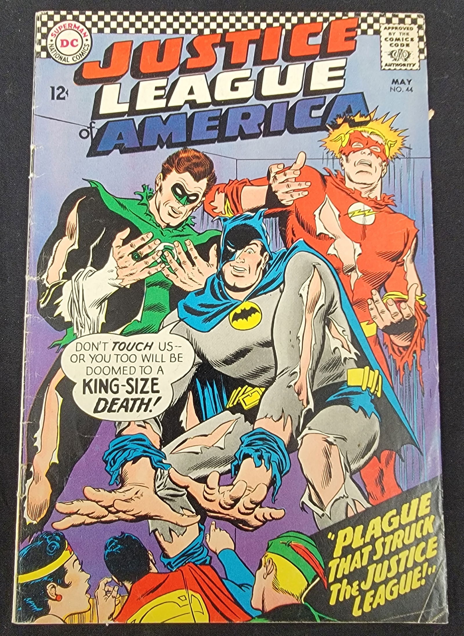Justice League of America 44 DC Comics May 1966: This Silver Age comic book is Justice League of America issue number 44, published by DC National Comics with a cover date of May 1966. The front cover features stylized illustrations of Batman,