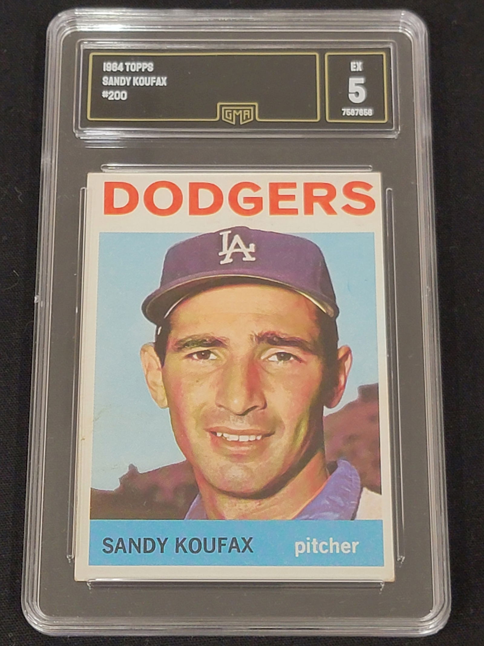 1964 Topps Sandy Koufax 200 Los Angeles Dodgers GMA EX 5: This 1964 Topps baseball card, number 200, features Hall of Fame pitcher Sandy Koufax of the Los Angeles Dodgers. The card front displays a color portrait of Koufax in a team cap, with the team name p