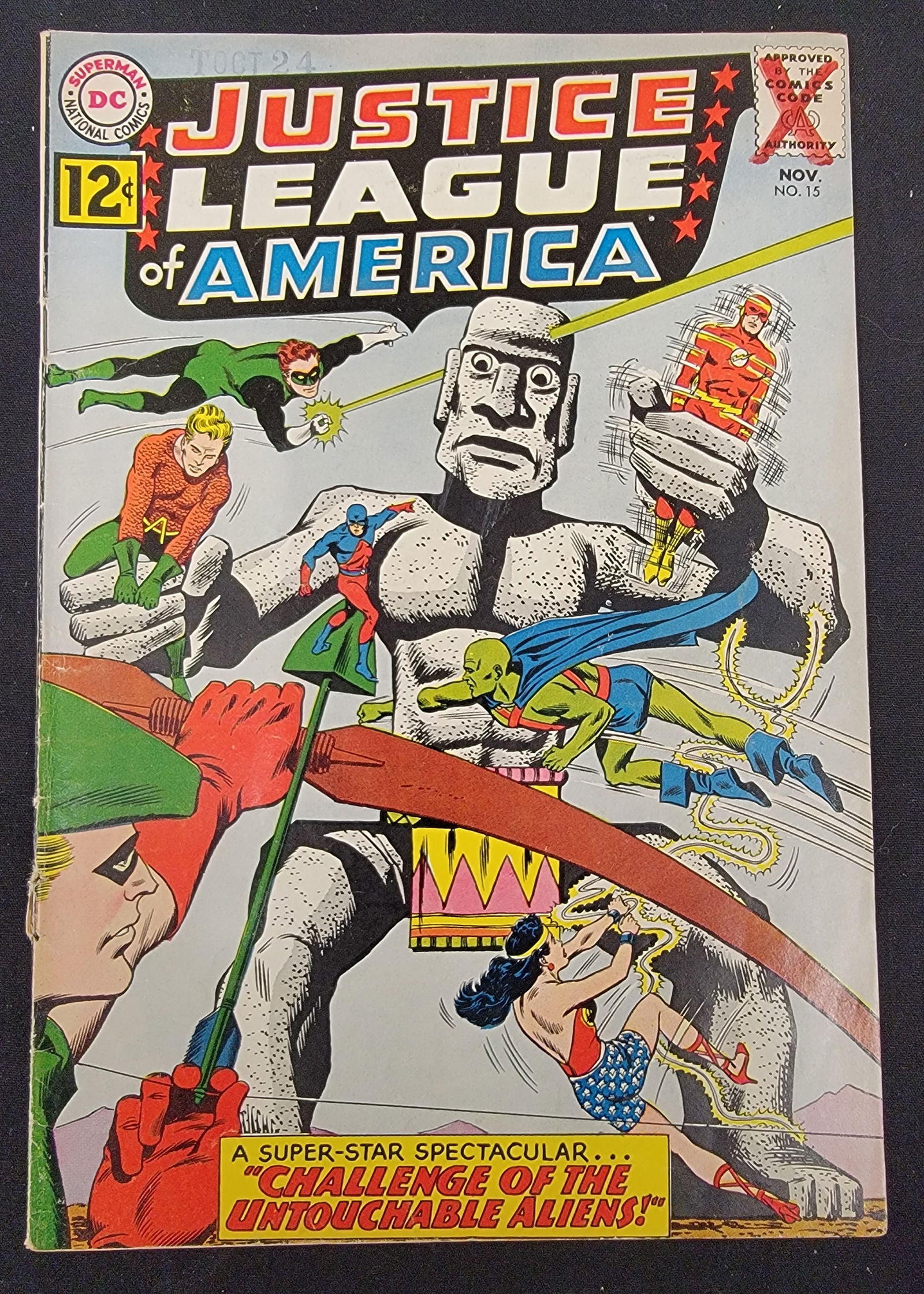 Justice League of America 15 DC Comics 1962: Justice League of America 15, published by National Comics DC in November 1962. This Silver Age comic book features a 12-cent cover price and the story Challenge of the Untouchable Aliens! The front
