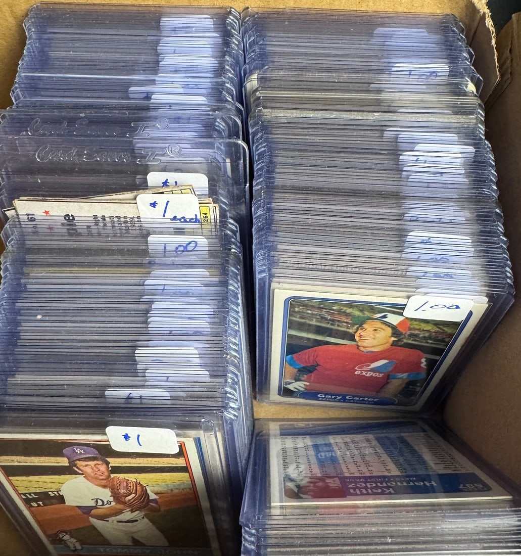 An Assortment of Vintage Topps Fleer and Donruss Baseball Cards: This lot consists of a large collection of baseball cards primarily dating from the 1970s and 1980s. The collection features cards from major manufacturers including Topps, Fleer, and Donruss.