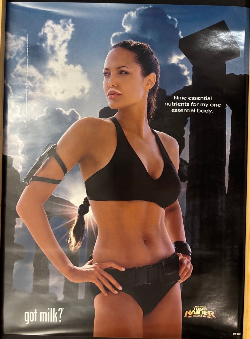 2003 Got Milk? Promotional Advertisement Poster Featuring Angelina Jolie as Lara Croft: A 2003 got milk? promotional advertisement poster featuring actress Angelina Jolie in her role as Lara Croft. This item was produced as a marketing tie-in for the theatrical release of the film Lara C
