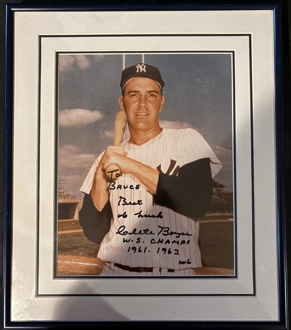 Clete Boyer Signed New York Yankees 8x10 Photo: Clete Boyer signed 8x10 color photograph. The image depicts the New York Yankees third baseman in a pinstriped home uniform and cap, posed with a baseball bat against a stadium background. The photogr