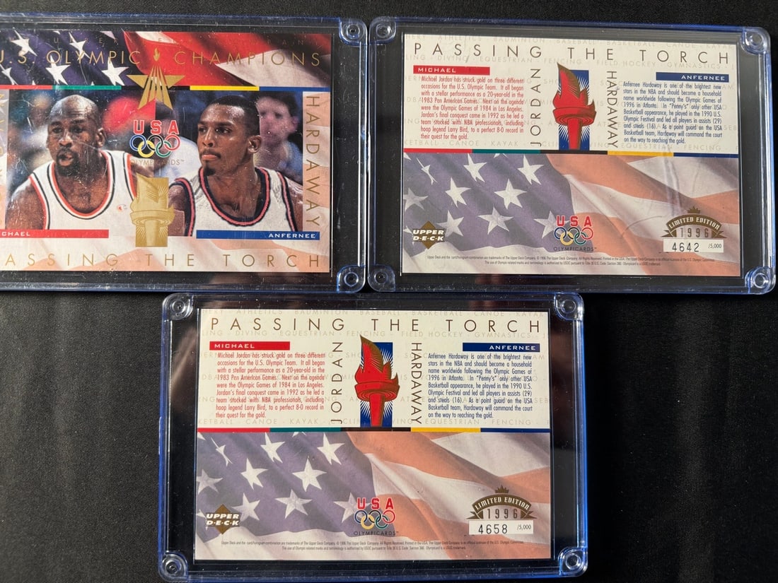 A Group of 1996 Upper Deck Passing the Torch Michael Jordan and Anfernee Hardaway USA Olympic: A group of 1996 Upper Deck Passing the Torch oversized trading cards featuring Michael Jordan and Anfernee Penny Hardaway. These cards commemorate the legacy of U.S. Olympic basketball. The front desi