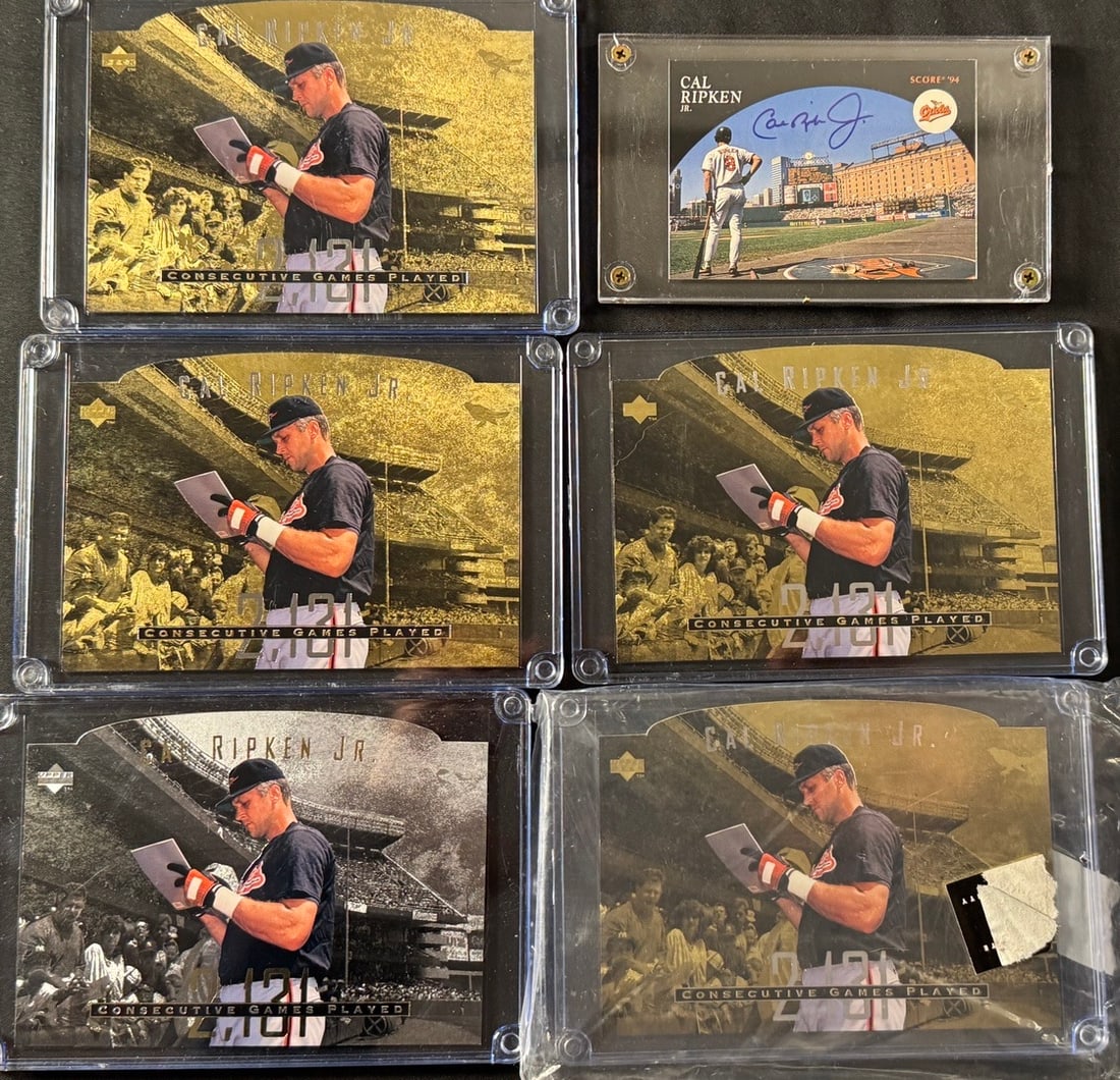 Cal Ripken Jr. 2131 Consecutive Games Played Commemorative Baseball Cards: A collection of commemorative baseball cards featuring Cal Ripken Jr. of the Baltimore Orioles. The group includes several Upper Deck cards celebrating his milestone of 2131 consecutive games played,