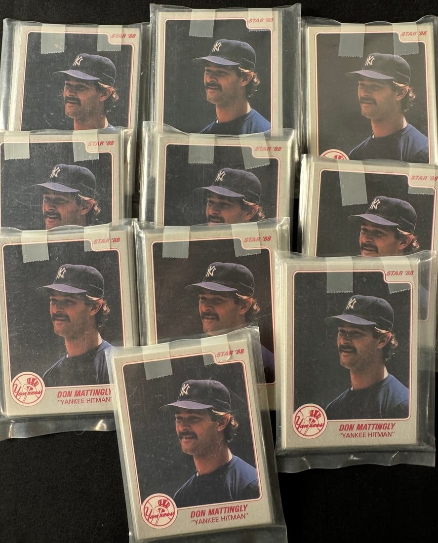 1988 Star Company Don Mattingly Yankee Hitman Baseball Card Sets - 10: A collection of 1988 Star Company baseball card sets featuring New York Yankees first baseman Don Mattingly. Each set is titled Yankee Hitman and displays a portrait of the player in team uniform and