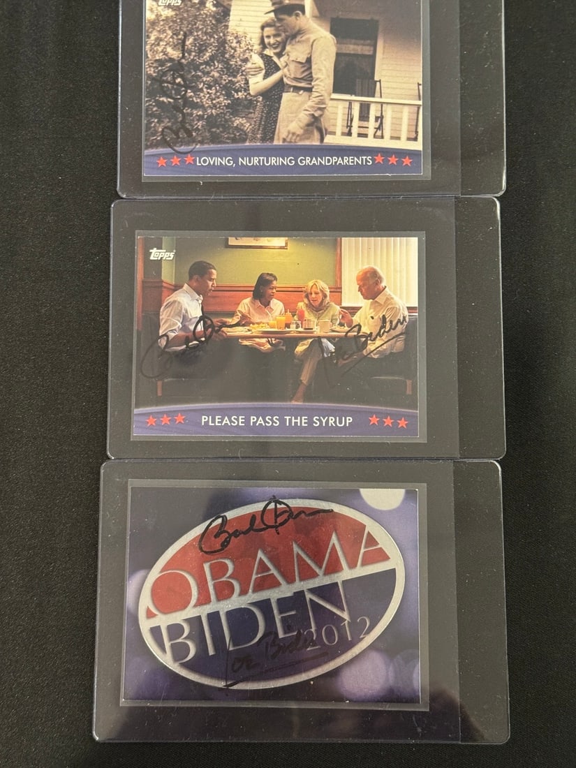 Topps Barack Obama and Joe Biden Trading Cards - Autographed: A trio of trading cards produced by Topps featuring Barack Obama and Joe Biden. The first card is titled Loving, Nurturing Grandparents and features a black and white photograph of a couple. The secon