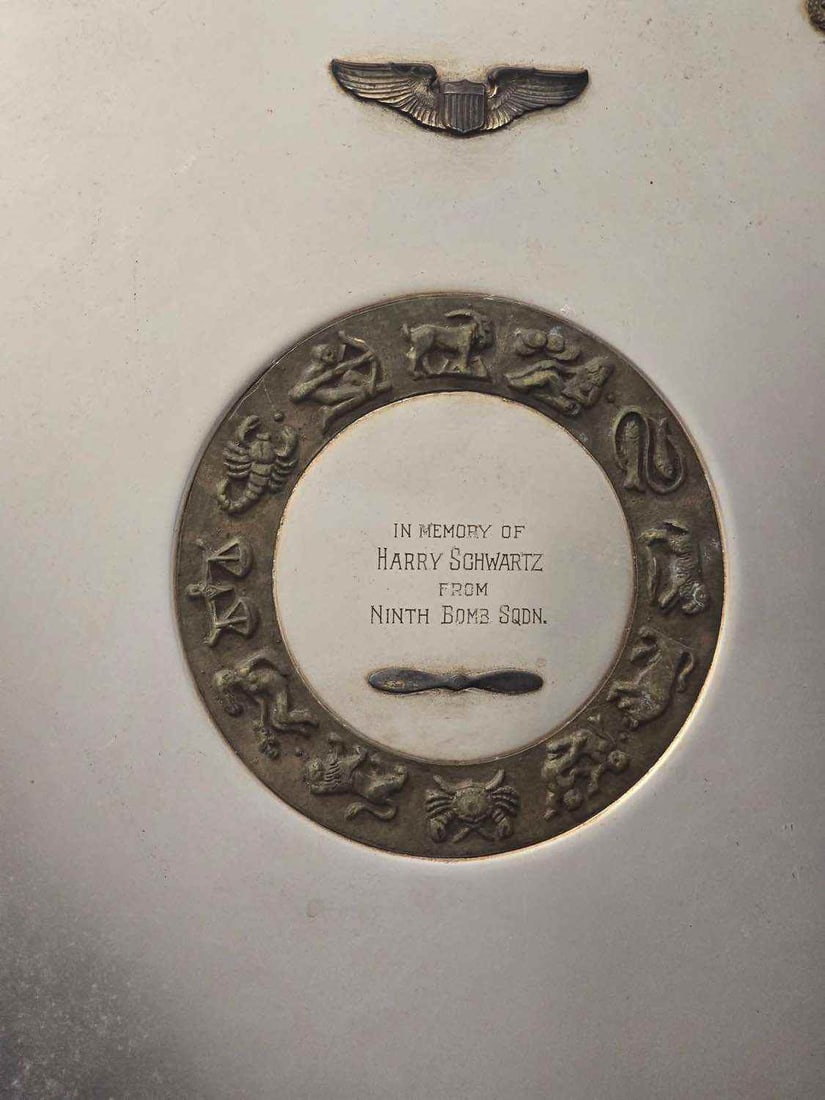 WWII Memory Plate Harry Schwartz 9th Bomb Squadron: WWII Memory Plate Harry Schwartz 9th Bomb Squadron. This lot features a World War II-era memorial plaque and original service documentation dedicated to Harry Schwartz of the U.S. Army Air Forces. The
