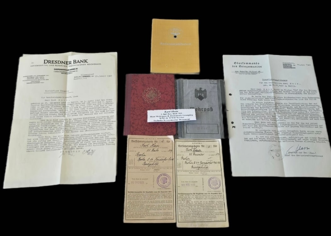 German WWI and WWII Service Documents 2 inf ers batl 323 kriegsmarine document Heer wehrpass: This collection primarily documents the career and military service of Karl Friedrich Hain, born December 25, 1897, in Berlin. The grouping includes a second-style grey cloth-covered Wehrpass for the