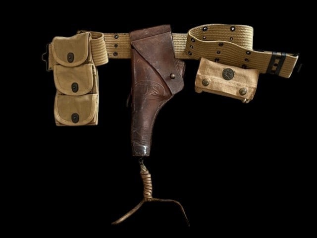 WWI US Army Officer - NCO Pistol Rig: A World War I era US Army officer or NCO pistol belt rig comprised of several period components. The set includes an M1912/1917 pattern tan canvas web belt featuring darkened brass hardware and a T-st