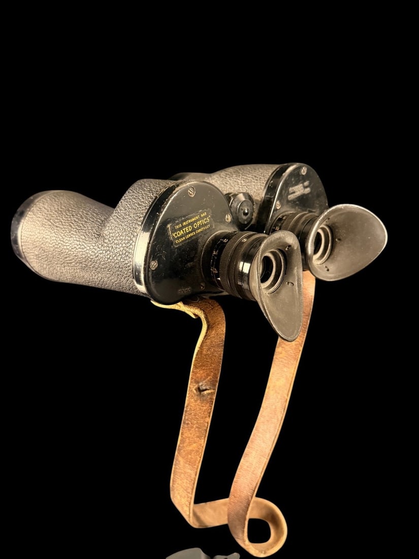 WWI-WWII US Army M15 Binoculars: This is a pair of US Army issue M15 pattern binoculars featuring 7x magnification and 50mm objective lenses. The right ocular plate is stamped with the designation BINOCULAR M15 followed by the contra