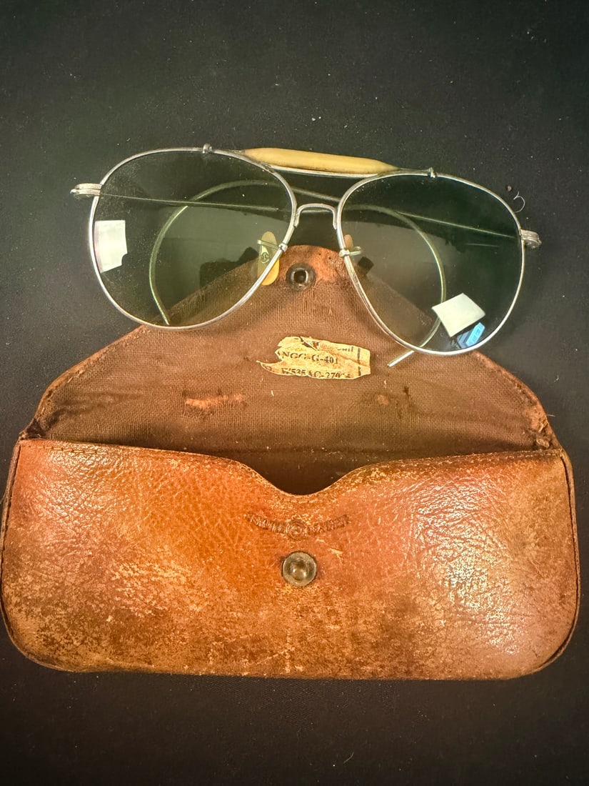 WWII Aviator Sun Glasses: A pair of vintage aviator-style sunglasses manufactured by Bausch & Lomb Optical Co. of Rochester, New York. This set conforms to the AN6531 Type II military specification produced for the U.S. Army A