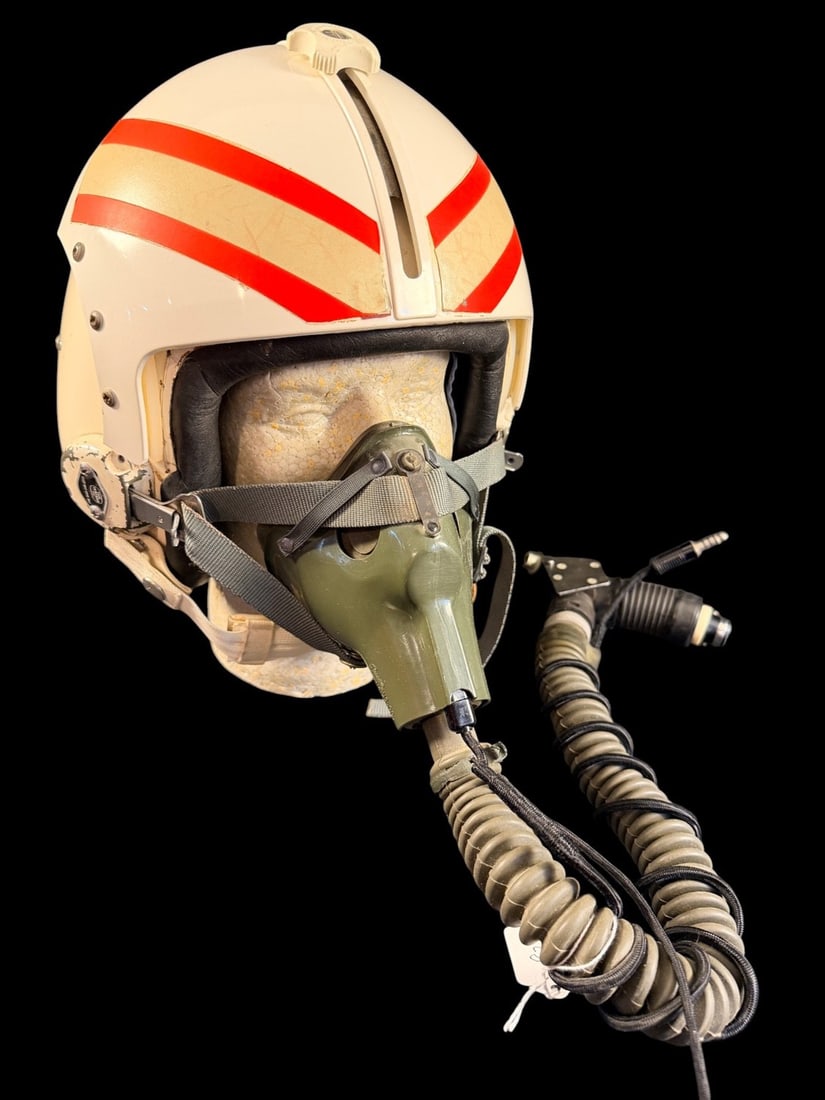 Vietnam Era APH-6 Dual Visor Flight Helmet: A mid-20th-century US Navy or Marine Corps APH-6 dual-visor flight helmet, widely utilized during the Vietnam War era. The helmet features a white-painted fiberglass shell decorated with reflective ta