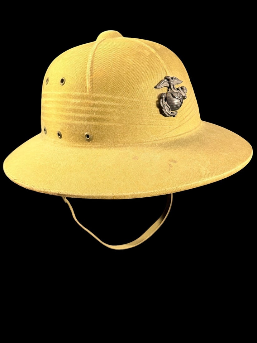 WWII USMC Parachute BN Pith Helmet: This is a United States military pressed fiber sun helmet, a standard pattern produced during World War II. The helmet is constructed from a rigid pressed fiber frame covered in a khaki cotton twill f