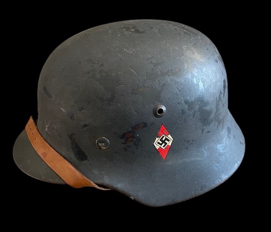 M35 Hitler Youth DD Helmet Large size: Extremely Rare German WWII M35 Double Decal Hitlerjugend HJ Helmet with Chinstrap and NamingThis lot features an extremely rare and desirable German helmet: a Model 1935 M35 Double Decal Combat Helmet