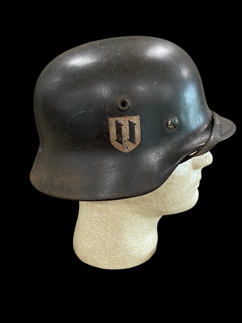 WWII SS Croatian Volunteer Helmet, Extremely Rare: This is an exceptionally rare original World War Two German M40 helmet distinguished by its dual decals identifying it as a piece of SS Croatian volunteer history. The black helmet shell features two