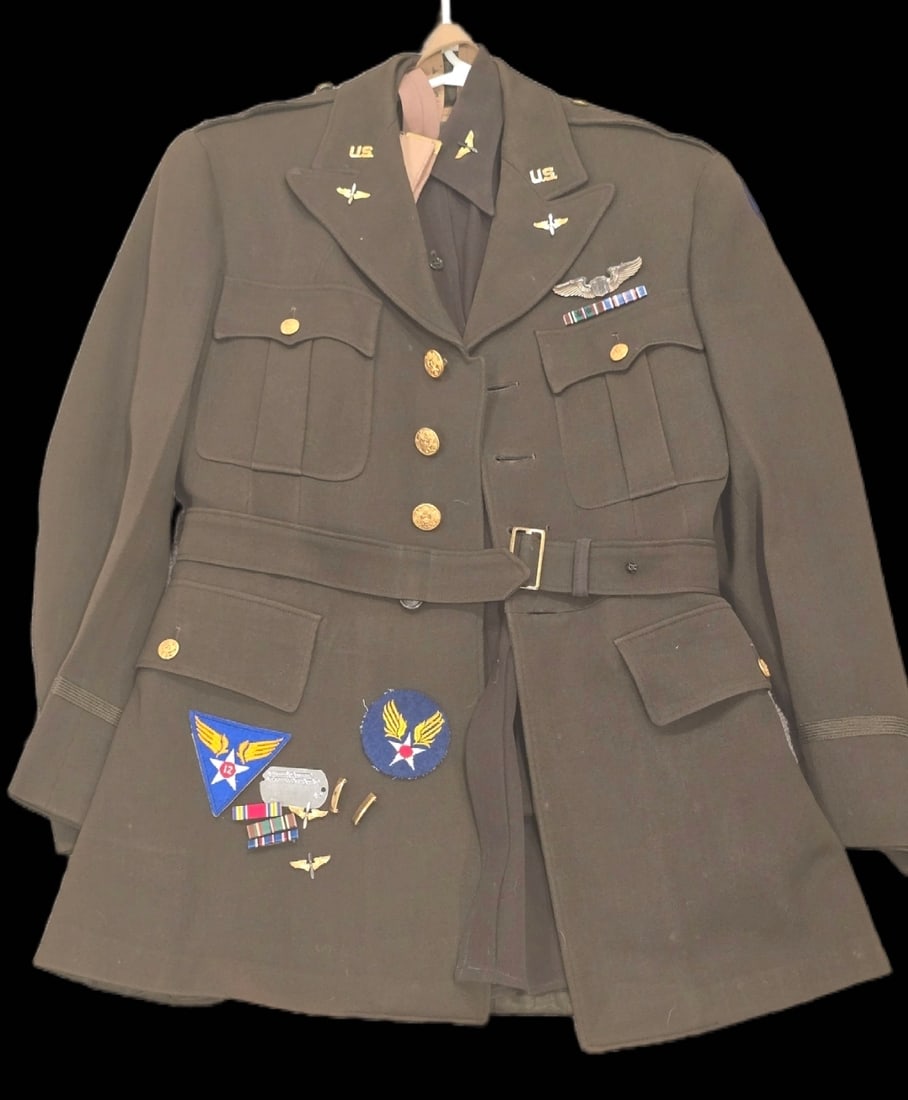 WWII Named 12th AAF Pilots Uniform Group: WWII Named 12th AAF Grouping , dog tags, named uniform, named pants, named tie. Officer shirt.