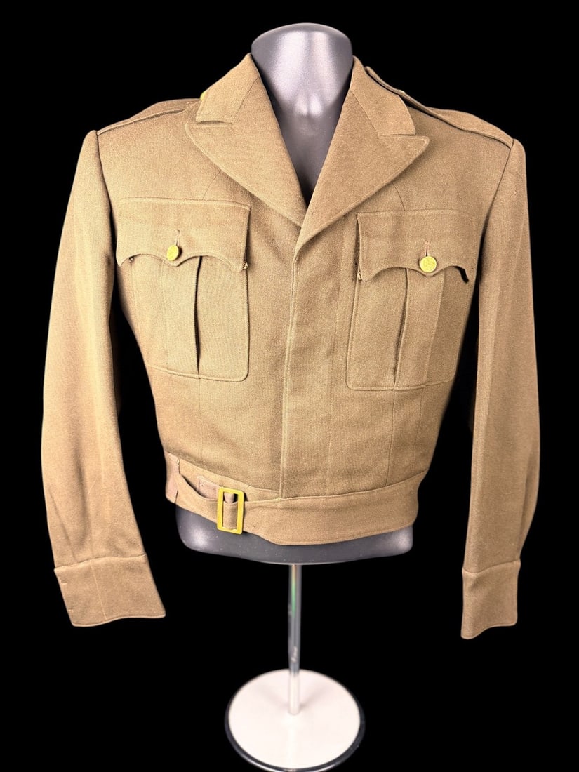 WWII British-Made Ike Jacket Named: As shown. No insignia present.