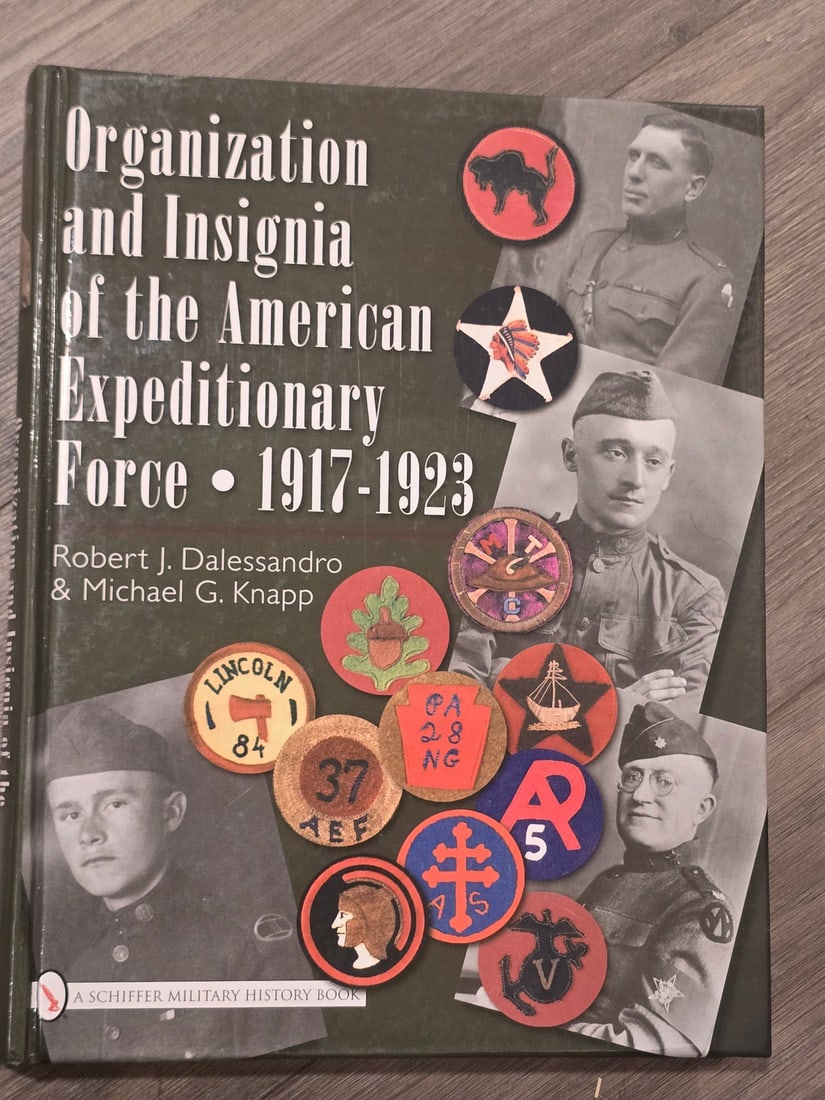 Book - Organization and Insignia of the American Expeditionary Force, 1917-1923: This specialized military history reference work, titled Organization and Insignia of the American Expeditionary Force, 1917-1923, is authored by Robert J. Dalessandro and Michael G. Knapp. Published