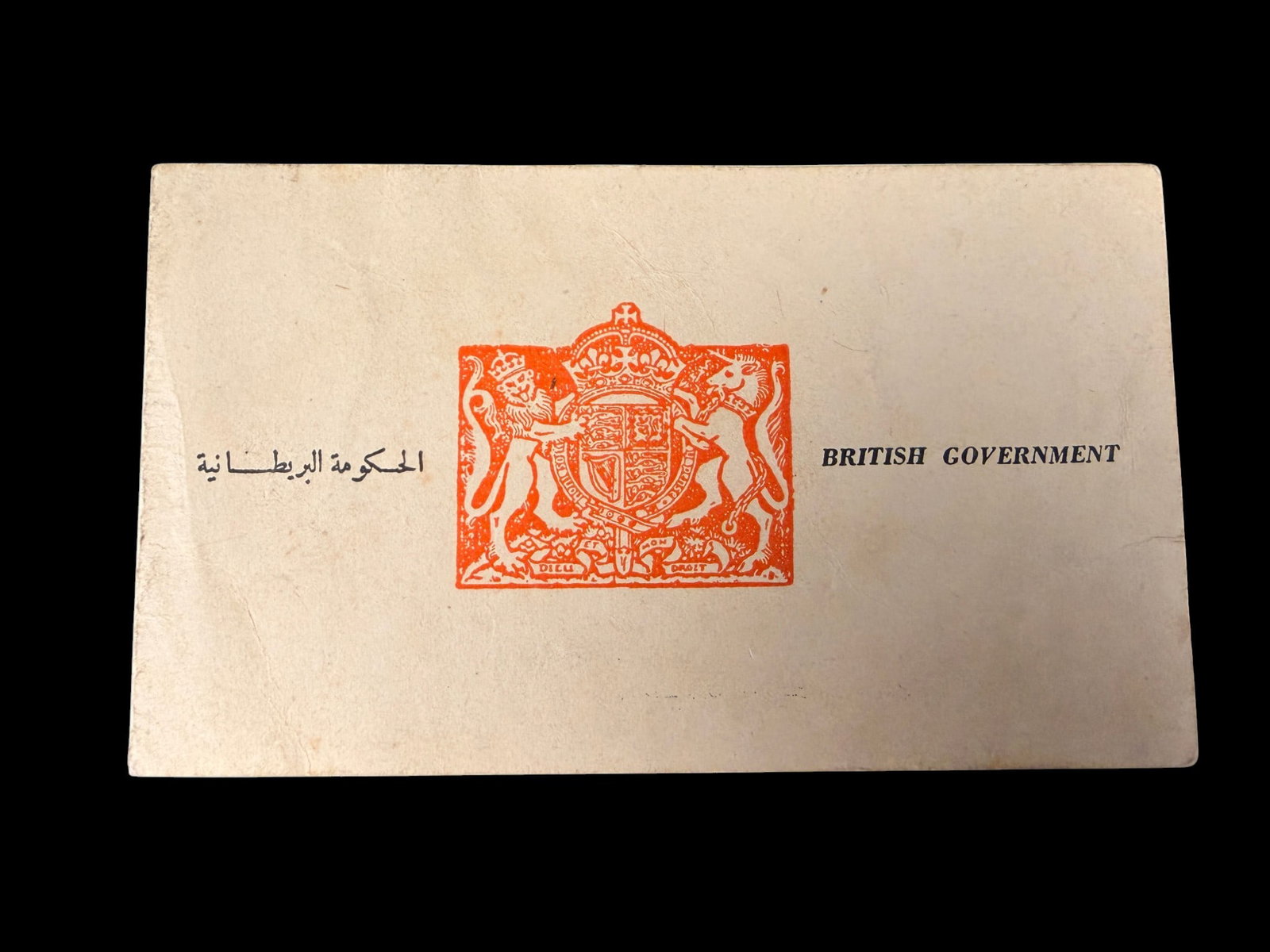 WWII RARE RAF Middle East Paper Blood Chit: An original WWII Royal Air Force (RAF) British Government “blood chit” issued for use in the Middle East theater, this scarce survival aid leaflet features the British coat of arms on the