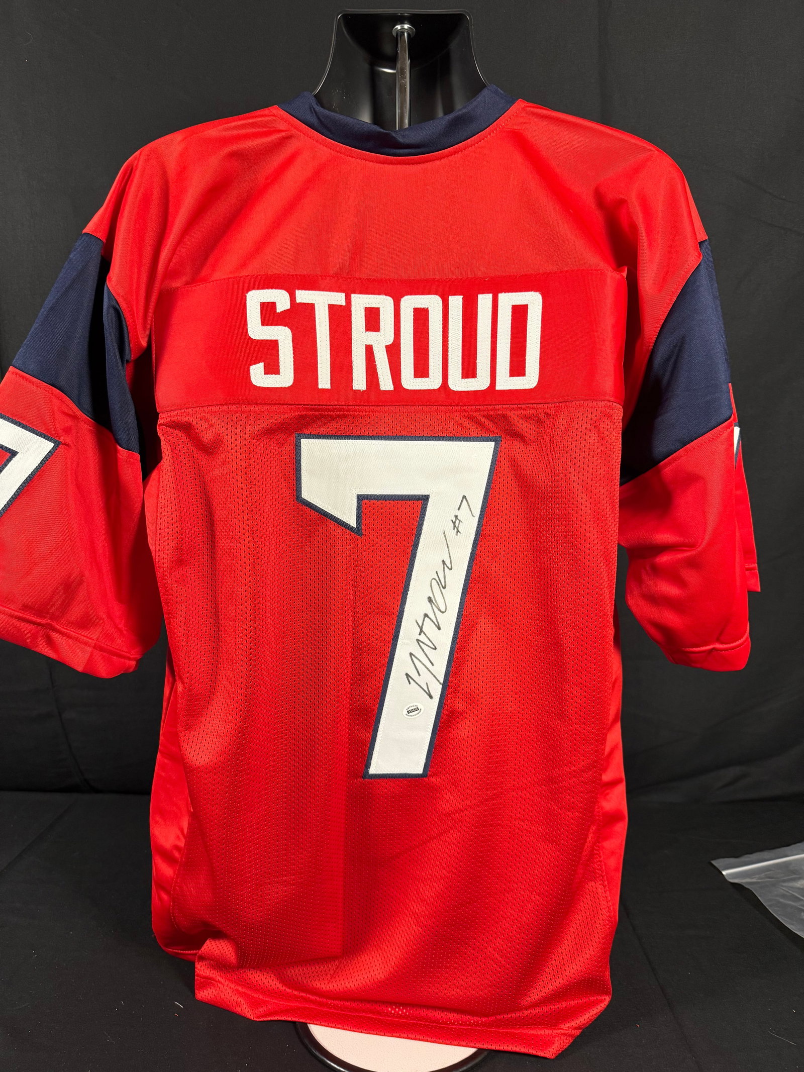 C.J. Stroud Signed Houston Texans Alternate Jersey: Signed custom red C.J. Stroud Houston Texans jersey with COA