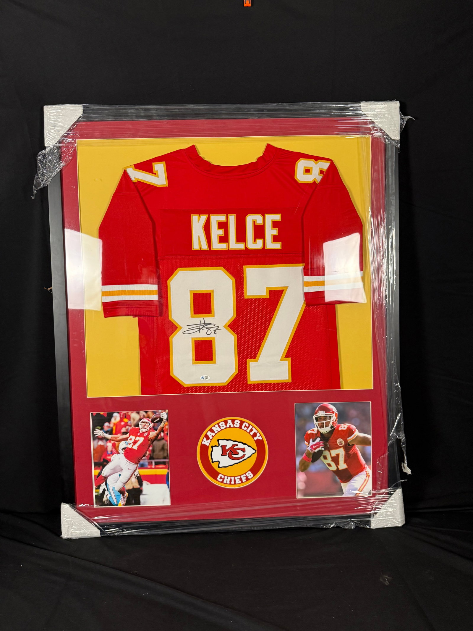 Travis Kelce Signed Kansas City Chiefs Framed Jersey: Signed framed Travis Kelce Kansas City Chiefs jersey with COA