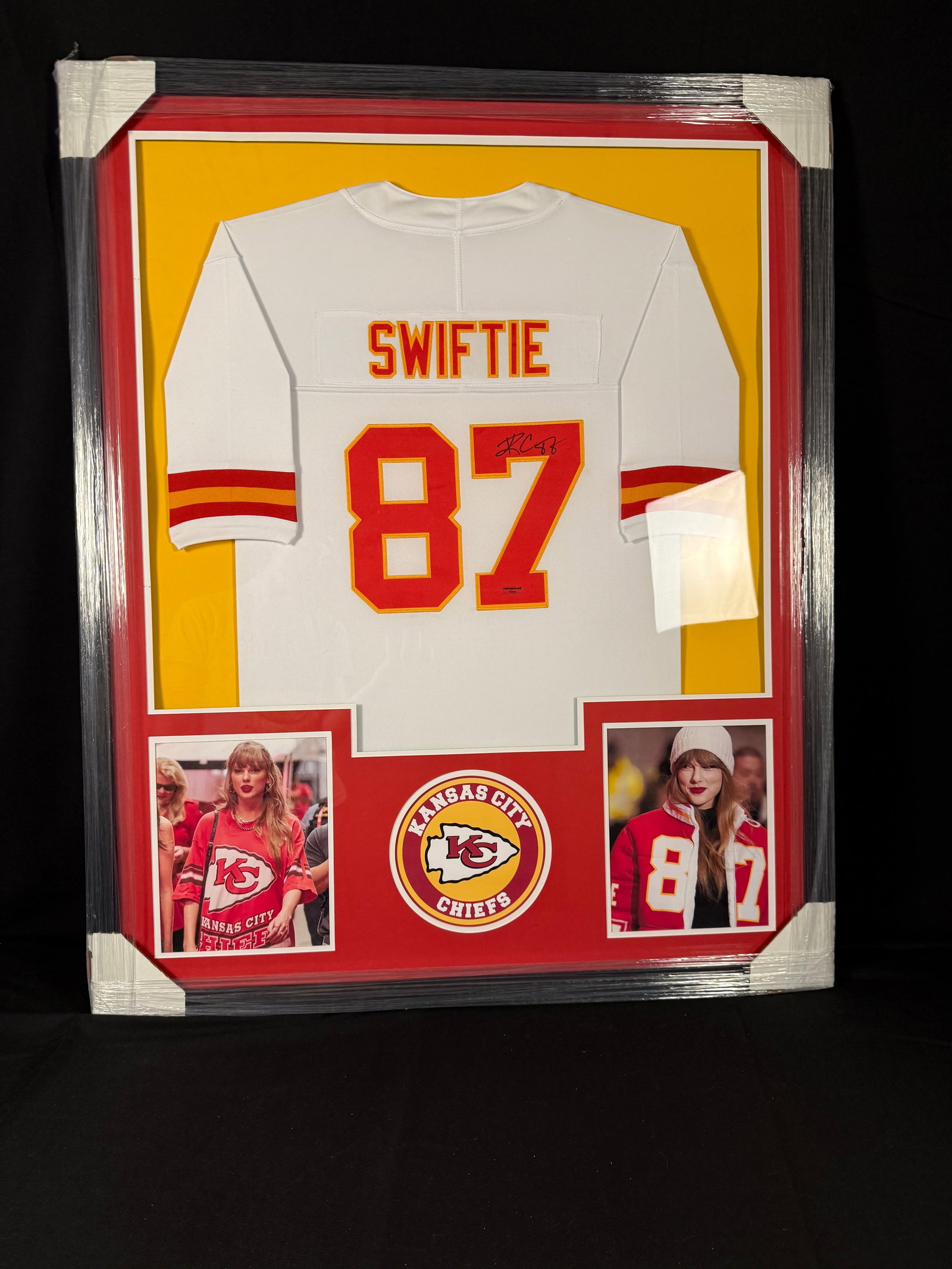 Travis Kelce Signed Swiftie Kansas City Chiefs Framed Jersey: Signed framed Swiftie Kansas City Chiefs jersey with COA