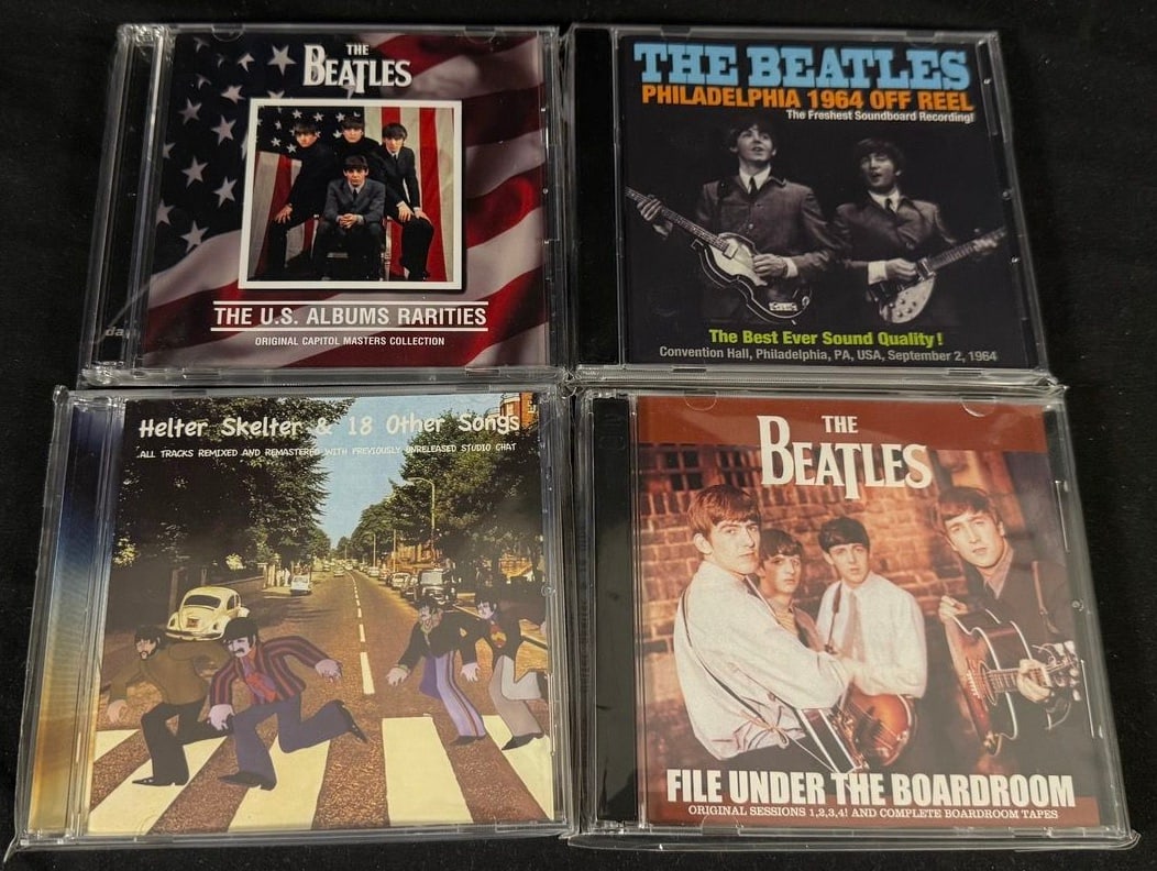 The Beatles Collector CD Collection - U.S. Rarities, Philadelphia 1964, Boardroom Sessions & Studio: An appealing collection of Beatles collector CDs highlighting rare U.S. Capitol mixes, historic live recordings, studio session material, and fan-produced outtakes.